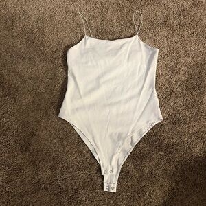 3 Wild Fable Bodysuits White, Black, and Blue Size Medium New Worn Once